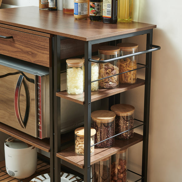 Estante de cocina extensible Kirhuskyna 130x40x85 cm aspecto nogal/negro [en.casa]