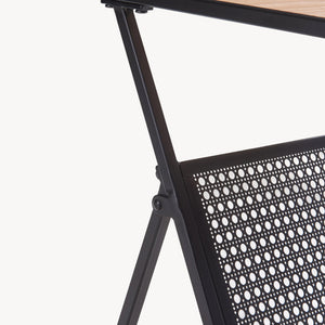 Mesa auxiliar con revistero Jäller [en.casa]